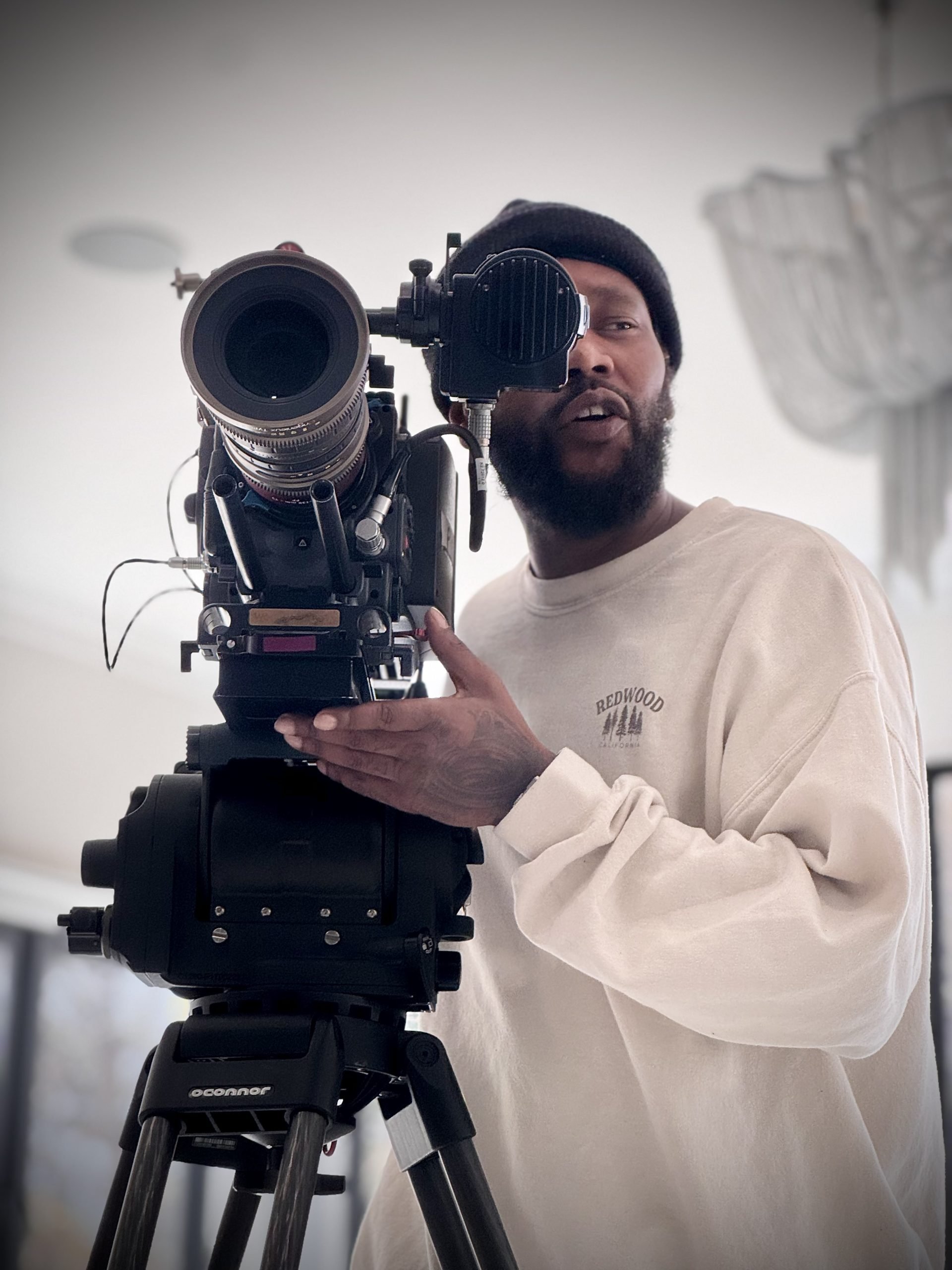 Golden Head, founder of AFz Media, working behind the scenes on a production